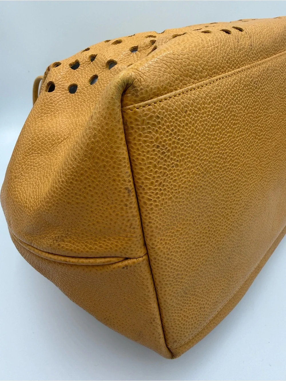 Chanel Perforated Drawstring Bucket Bag in Caviar Leather